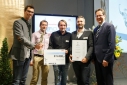 Die Gewinner des Mercur '15 von "Mikme GmbH" mit Dr. Rainer Trefelik